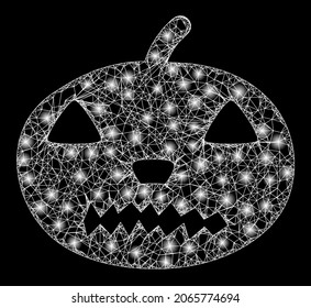 Glowing wire frame halloween pumpkin with light spots. Vector frame based on halloween pumpkin icon, and with crossing lines. Sparkle frame mesh halloween pumpkin on a black background.
