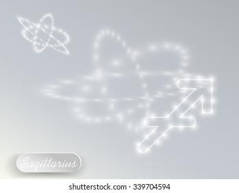 Glowing zodiac sign on a gray background