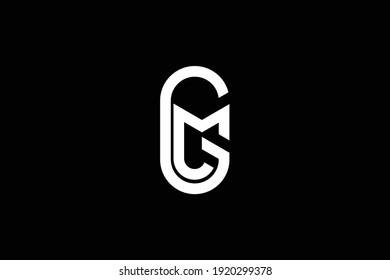 GM letter logo design on luxury background. MG monogram initials letter logo concept. GM icon design. MG elegant and Professional white color letter icon design on black background.
