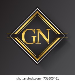 GN Letter logo in a square shape gold and silver colored geometric ornaments