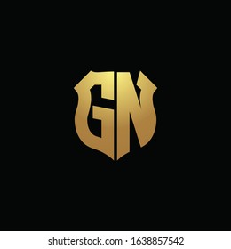 GN logo monogram with gold colors and shield shape design template