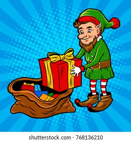 Gnome Santa Claus helper with gift box pop art retro vector illustration. Comic book style imitation.