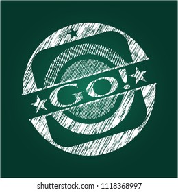 Go! chalk emblem written on a blackboard