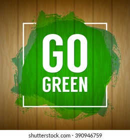 Go green concept. Nature background. Go green design concept. Wood background with paint splash. Wooden texture sign with painted splatter and Go green text. Banner, background, abstract eco banner