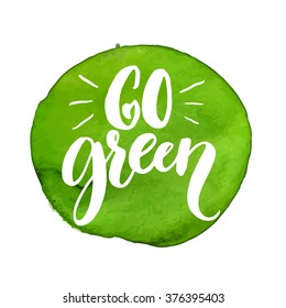 Go green label. Handmade lettering at green watercolor stain. Vector badge for natural products, eco cosmetics and food.