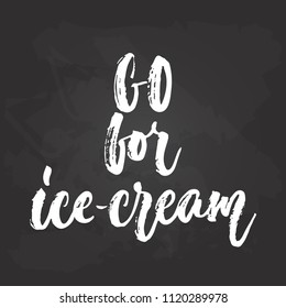 Go for ice-cream - hand drawn seasons holiday lettering phrase isolated on the black chalkboard background. Fun brush ink vector illustration for banners, greeting card, poster design