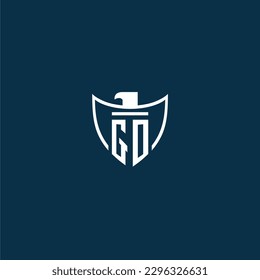 GO initial monogram logo for shield with eagle image vector design