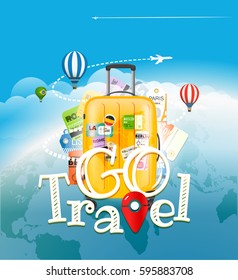 Go travel concept. Travel bag and different touristic elements