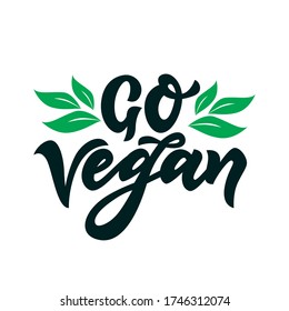 Go Vegan With green leaves. Hand calligraphy lettering. Organic food tag, isolated icon. As template of logo cafe, restaurants, products packaging. Vector illustration. Vegetarian lifestyle concept.