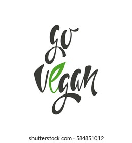 Go vegan. Inspirational quote about vegetarian. Modern calligraphy phrase with hand drawn leaf. Handwritten lettering for print and poster. Typography design.