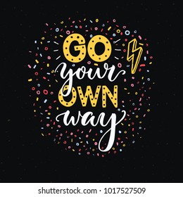 Go your own way. Motivational quote poster of t-shirt print. White and yellow typography on dark black background with colorful texture.