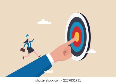 Goal oriented, setting goal and focus on target facilitate to achieve success, work toward mission target, motivation and anticipation to win concept, businesswoman run on hand pointing toward target.