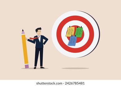 Goal setting, achievable target, mission to accomplish for business success concept, businessman write down goal on notes and put on big dartboard target.