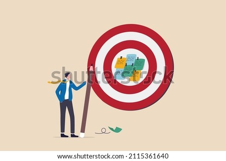 Goal setting, achievable target or purposeful objective, mission to accomplish or challenge to win for business success concept, businessman write down goal on notes and put on big dartboard target.