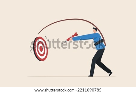 Goal setting. achieve goals to the ability. Take action for target. Focus on business goal.Overcome yourself to success.  Businessman chasing dartboard.