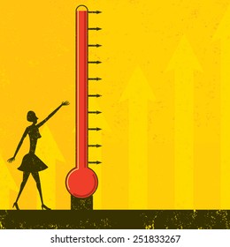 Goal Thermometer A woman measuring the progress of a large fund raising thermometer. The level of mercury is easy to move up and down. 