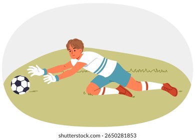 Goalkeeper guy plays football and jumps for ball, protecting goal from enemy team. Teenage boy is interested in football and dreams of becoming professional player from famous club.