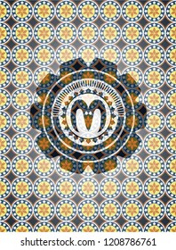 goat head icon inside arabesque badge. arabic decoration.