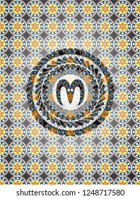 goat head icon inside arabesque badge background. arabic decoration.
