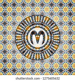goat head icon inside arabesque badge. arabic decoration.