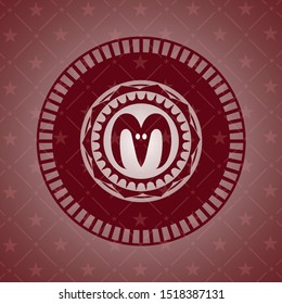 goat head icon inside badge with red background