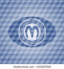 goat head icon inside blue emblem or badge with abstract geometric pattern background.