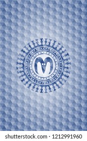 goat head icon inside blue hexagon badge.