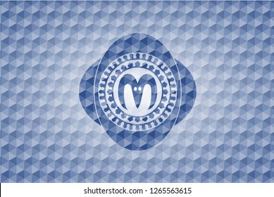 goat head icon inside blue badge with geometric background.