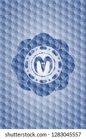goat head icon inside blue polygonal badge.