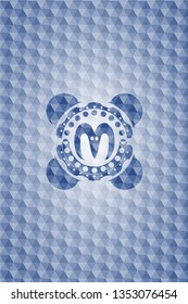 goat head icon inside blue polygonal badge.