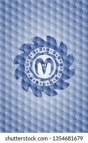goat head icon inside blue polygonal badge.