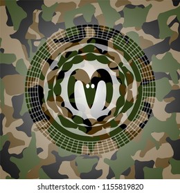 goat head icon inside camo texture