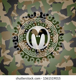 goat head icon inside camo texture