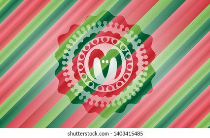 goat head icon inside christmas emblem background.