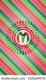 goat head icon inside christmas colors style badge.