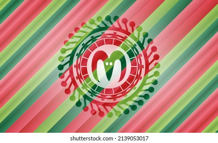 goat head icon inside christmas emblem. 