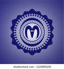 goat head icon inside emblem with jean high quality background