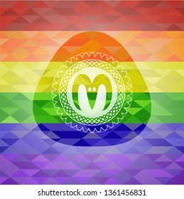 goat head icon inside emblem on mosaic background with the colors of the LGBT flag