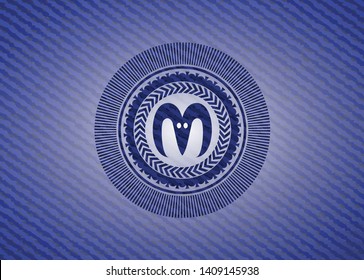 goat head icon inside emblem with jean high quality background