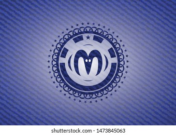 goat head icon inside emblem with jean high quality background
