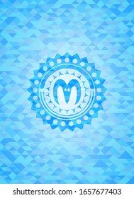 goat head icon inside light blue emblem with mosaic ecological style background