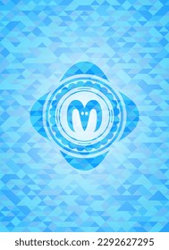 goat head icon inside light blue emblem with mosaic background. 