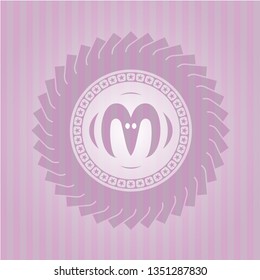 goat head icon inside pink emblem