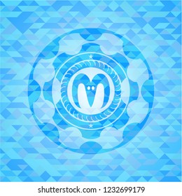goat head icon inside realistic sky blue emblem. Mosaic background