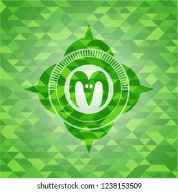 goat head icon inside realistic green mosaic emblem