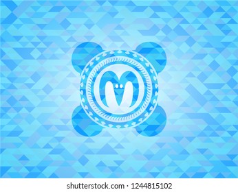 goat head icon inside realistic light blue mosaic emblem