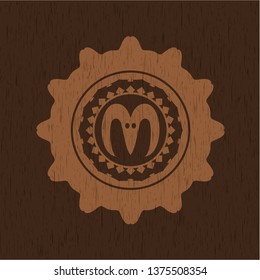 goat head icon inside realistic wooden emblem