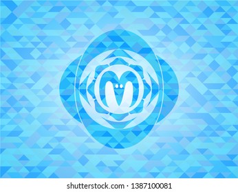 goat head icon inside realistic light blue mosaic emblem