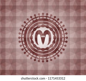 goat head icon inside red seamless badge with geometric background.