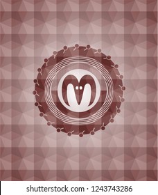 goat head icon inside red seamless emblem with geometric background.